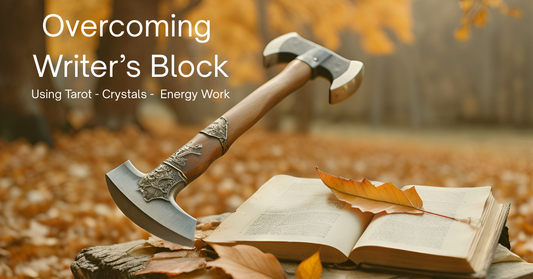 Text: Overcoming Writer's Block using tarot, crystals and energy work. Image:: Axe coming down onto a wood chopping block with a book sitting on top.